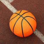 one basketball ball on playground rubber coating 2022 11 10 01 16 48 utc scaled.jpg