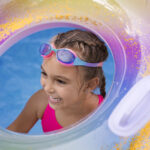 child having fun with floater pool