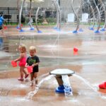 kids playing at the water park 2023 11 27 04 49 21 utc